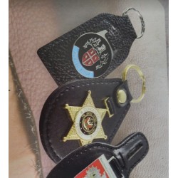 Leather keychain with metal badge, custom-made